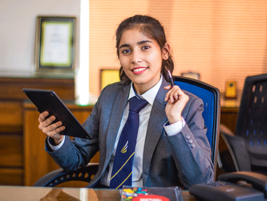 Inspiria student with a tablet